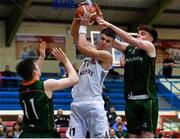 6 January 2018; Conor O'Sullivan of Neptune in action against Connor Curran, left, and Paul Kelly of Moycullen during the Hula Hoops Under 20 Men’s National Cup semi-final match between Moycullen and Neptune at Neptune Stadium in Cork. Photo by Eóin Noonan/Sportsfile