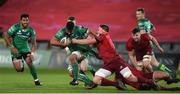6 January 2018; Jarrad Butler of Connacht is tackled by CJ Stander and Ian Keatley of Munster during the Guinness PRO14 Round 13 match between Munster and Connacht at Thomond Park in Limerick. Photo by Matt Browne/Sportsfile