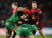 6 January 2018; Ian Keatley of Munster is tackled by Pita Ahki, left, and Tom McCartney of Connacht during the Guinness PRO14 Round 13 match between Munster and Connacht at Thomond Park in Limerick. Photo by Diarmuid Greene/Sportsfile