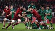 6 January 2018; Caolin Blade of Connacht is tackled by Conor Murray and Darren O'Shea of Munster during the Guinness PRO14 Round 13 match between Munster and Connacht at Thomond Park in Limerick. Photo by Matt Browne/Sportsfile