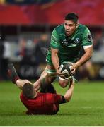6 January 2018; Jarrad Butler of Connacht is tackled by Andrew Conway of Munster during the Guinness PRO14 Round 13 match between Munster and Connacht at Thomond Park in Limerick. Photo by Diarmuid Greene/Sportsfile