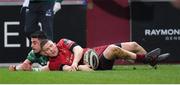 6 January 2018; Andrew Conway of Munster goes over to score his side's second try despite the tackle of Tiernan O’Halloran of Connacht during the Guinness PRO14 Round 13 match between Munster and Connacht at Thomond Park in Limerick. Photo by Matt Browne/Sportsfile