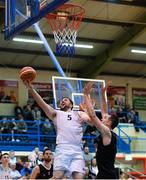 6 January 2018; Dylan Corkery of Ballincollig scoring a layup despite the efforts of Dan Griffin of Scotts Lakers St Paul’s Killarney during the Hula Hoops President’s Cup semi-final match between Scotts Lakers St Paul’s Killarney and Ballincollig at Neptune Stadium in Cork. Photo by Eóin Noonan/Sportsfile