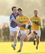 7 January 2018; Paddy McAleer of Antrim is tackled by Niall McKiernan of Cavan during the Bank of Ireland Dr. McKenna Cup Section A Round 2 match between Antrim and Cavan at Woodlands Playing Fields in Belfast. Photo by Ramsey Cardy/Sportsfile