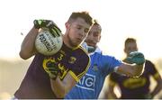 7 January 2018; Mark O'Neill of Wexford in action against Garry Seaver of Dublin during the Bord na Mona O'Byrne Cup Group 1 Third Round match between Wexford and Dublin at St. Patricks Park in Wexford. Photo by Matt Browne/Sportsfile