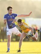 7 January 2018; Paddy McAleer of Antrim is tackled by Niall McKiernan of Cavan during the Bank of Ireland Dr. McKenna Cup Section A Round 2 match between Antrim and Cavan at Woodlands Playing Fields in Belfast. Photo by Ramsey Cardy/Sportsfile