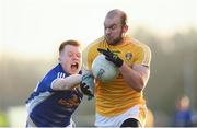 7 January 2018; Sean McVeigh of Antrim is tackled by Bryan Magee of Cavan during the Bank of Ireland Dr. McKenna Cup Section A Round 2 match between Antrim and Cavan at Woodlands Playing Fields in Belfast. Photo by Ramsey Cardy/Sportsfile