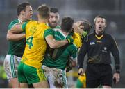 10 January 2018; Fermanagh and Donegal players in dispute as Referee Padraig Hughes looks on during the Bank of Ireland Dr. McKenna Cup Section C Round 3 match between Donegal and Fermanagh at Páirc MacCumhaill in Ballybofey, Donegal. Photo by Oliver McVeigh/Sportsfile