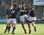 11 January 2018; Jamie Ukagba of The High School is tackled by Rory Coan and Fionn Gilbert of Mount Temple during the Bank of Ireland Leinster Schools Vinnie Murray Cup Round 1 match between The High School and Mount Temple at Donnybrook Stadium in Dublin. Photo by Matt Browne/Sportsfile