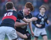11 January 2018; Eoin Dillon of Mount Temple is tackled by Harry O'Donnell and Cian Hoban of The High School during the Bank of Ireland Leinster Schools Vinnie Murray Cup Round 1 match between The High School and Mount Temple at Donnybrook Stadium in Dublin. Photo by Matt Browne/Sportsfile