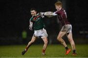 12 January 2018; Michael Plunkett of Mayo and Peter Cooke of Galway tussle during the Connacht FBD League Round 2 refixture match between Mayo and Galway at Elverys MacHale Park in Castlebar, Mayo. Photo by Piaras Ó Mídheach/Sportsfile