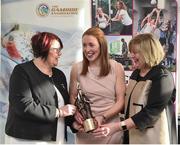 13 January 2018; Cork Camogie and Ladies Football legend Rena Buckley was today honoured by both the Camogie Association and Ladies Gaelic Football Association in a special event hosted in Cork’s Páirc Uí Chaoimh to recognise her extraordinary achievements in her career to date. Rena was presented with a special sculpture to mark her incredible haul of All-Ireland titles in both codes which now total 11 titles in Ladies Football and 7 in Camogie to make her the most successful player in Gaelic Games with 18 All-Ireland titles in addition to numerous other club, county and individual accolades. In 2017 she also completed the unique achievement of having captained her county to glory in both Camogie and Ladies Football during her career. The Presidents of both Associations, Catherine Neary of the Camogie Association and Marie Hickey of the LFGA were on hand to present Rena with her award along with a host of friends, family, current and former teammates amongst the attendees at today’s event. Pictured at the event are, from left, President of the Camogie Association Catherine Neary, Rena Buckley, and President of the Ladies Gaelic Football Association Maire Hickey, at Páirc Uí Chaoimh in Cork. Photo by Seb Daly/Sportsfile