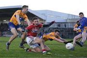 13 January 2018; Mark Collins of Cork in action against Cillian Brennan, Eoghan Collins, and Clare goalkeeper Killian Roche during the McGrath Cup Final between Cork and Clare at Mallow GAA Complex in Mallow, Co. Cork. Photo by Diarmuid Greene/Sportsfile