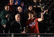 13 January 2018; Cork captain Jamie O'Sullivan is presented with the cup by Munster GAA Chairman Jerry O'Sullivan after the McGrath Cup Final between Cork and Clare at Mallow GAA Complex in Mallow, Co. Cork. Photo by Diarmuid Greene/Sportsfile