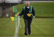 14 January 2018; Steward Gene Smith sets out the touchline flags prior to the Bord na Mona O'Byrne Cup semi-final match between Meath and Longford at Páirc Táilteann in Navan, Meath. Photo by Seb Daly/Sportsfile