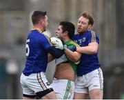 14 January 2018; Ben Brennan of Meath, centre, tussles with Michael Quinn, left, and Padraig McCormack of Longford during the Bord na Mona O'Byrne Cup semi-final match between Meath and Longford at Páirc Táilteann in Navan, Meath. Photo by Seb Daly/Sportsfile