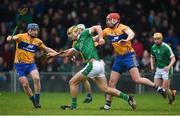 14 January 2018; Dan Morrissey of Limerick in action against Padraic Collins, left, and Niall Deasy of Clare during Co-Op Superstores Munster Senior Hurling League Final between Limerick and Clare at Gaelic Grounds in Limerick. Photo by Diarmuid Greene/Sportsfile