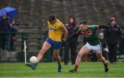 14 January 2018; Enda Smith of Roscommon in action against Diarmuid O'Connor of Mayo during the Connacht FBD League Round 4 match between Roscommon and Mayo at Dr Hyde Park in Roscommon. Photo by Piaras Ó Mídheach/Sportsfile