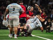 14 January 2018; Conor Murray of Munster is tackled into touch by Camille Chat and Teddy Thomas of Racing 92 during the European Rugby Champions Cup Pool 4 Round 5 match between Racing 92 and Munster at the U Arena in Paris, France. Photo by Brendan Moran/Sportsfile