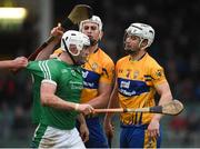 14 January 2018; Aaron Gillane of Limerick tussles off the ball with Conor Cleary and Patrick O'Connor of Clare during Co-Op Superstores Munster Senior Hurling League Final between Limerick and Clare at Gaelic Grounds in Limerick. Photo by Diarmuid Greene/Sportsfile