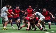 14 January 2018; Chris Farrell of Munster attempts to break through the tackles of Camille Chat and Teddy Thomas of Racing 92 during the European Rugby Champions Cup Pool 4 Round 5 match between Racing 92 and Munster at the U Arena in Paris, France. Photo by Brendan Moran/Sportsfile