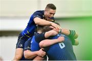 14 January 2018; Jordi Murphy of Leinster is congratulated by teammates including Jordan Larmour, top, after scoring his side's first try during the European Rugby Champions Cup Pool 3 Round 5 match between Leinster and Glasgow Warriors at the RDS Arena in Dublin. Photo by Ramsey Cardy/Sportsfile
