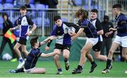 15 January 2018; Harry O'Neill of Dundalk Grammar School is tackled by Travis Reidy Wilson and Naoise Smith O'Carroll of Mount Temple during the Community School Bank of Ireland Leinster Schools Fr. Godfrey Cup Round 1 match between Dundalk Grammar School and Mount Temple at Donnybrook Stadium in Dublin. Photo by Matt Browne/Sportsfile