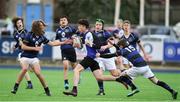 15 January 2018; Dylan Keating of Dundalk Grammar School is tackled by William Keenan and Naoise Smith O'Carroll of Mount Temple during the Community School Bank of Ireland Leinster Schools Fr. Godfrey Cup Round 1 match between Dundalk Grammar School and Mount Temple at Donnybrook Stadium in Dublin. Photo by Matt Browne/Sportsfile