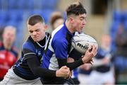 15 January 2018; Aidan Keane of Dundalk Grammar School is tackled by Dominic Damianov of Mount Temple during the Community School Bank of Ireland Leinster Schools Fr. Godfrey Cup Round 1 match between Dundalk Grammar School and Mount Temple at Donnybrook Stadium in Dublin. Photo by Matt Browne/Sportsfile