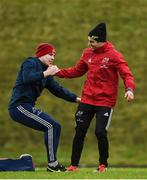 16 January 2018; Alex Wootton is helped to his feet by team-mate James Hart during Munster Rugby squad training at the University of Limerick in Limerick. Photo by Diarmuid Greene/Sportsfile