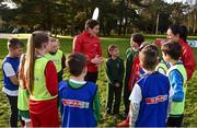 16 January 2018; The SPAR FAI Primary School 5s Programme was launched with a pop up training session at Scoil Mhuire CBS, Dublin, where former Republic of Ireland footballer and past pupil, Keith Andrews and current Republic of Ireland women's footballer, Megan Campbell provided a coaching masterclass to students from Scoil Mhuire CBS and St Vincent de Paul’s Girls NS. The five-a-side school blitzes are open to boys and girls from 4th, 5th and 6th class, and puts emphasis on fun and inclusivity. Register for the SPAR5s by February 9th at www.fai.ie/primary5. Pictured is former Republic of Ireland footballer and past pupil of Scoil Mhuire CBS Keith Andrews, centre, and current Republic of Ireland women's footballer, Megan Campbell, right, as they coach pupils during a pop-up training session, at Scoil Mhuire CBS, Clontarf, Dublin. Photo by Seb Daly/Sportsfile