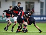 16 January 2018; Max Hauxwell of The High School is tackled by Hugh Grant, left, and Adam Walker, right, of Wesley College during the Bank of Ireland Leinster Schools Fr. Godfrey Cup Round 1 match between Wesley College and The High School at Donnybrook Stadium in Dublin.  Photo by Eóin Noonan/Sportsfile