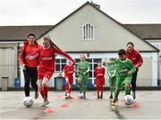 16 January 2018; The SPAR FAI Primary School 5s Programme was launched with a pop up training session at Scoil Mhuire CBS, Dublin, where former Republic of Ireland footballer and past pupil, Keith Andrews and current Republic of Ireland women's footballer, Megan Campbell provided a coaching masterclass to students from Scoil Mhuire CBS and St Vincent de Paul’s Girls NS. The five-a-side school blitzes are open to boys and girls from 4th, 5th and 6th class, and puts emphasis on fun and inclusivity. Register for the SPAR5s by February 9th at www.fai.ie/primary5. Pictured are former Republic of Ireland footballer and past pupil, Keith Andrews, left, as he coaches St Vincent de Paul’s Girls NS pupil Louise Hennessey, age 12, and current Republic of Ireland women's footballer, Megan Campbell, right, as she coaches current Scoil Mhuire CBS pupil Rey Medina, age 10, at Scoil Mhuire CBS, Clontarf, Dublin. Photo by Seb Daly/Sportsfile