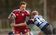 18 January 2018; Eoghan Buckley of CUS is tackled by Matthew Jungmann of Newpark Comprehensive during the Bank of Ireland Leinster Schools Vinnie Murray Cup Round 2 match between Newpark Comprehensive and CUS at Donnybrook Stadium, in Dublin. Photo by Eóin Noonan/Sportsfile