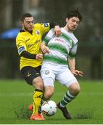 20 January 2018; Aaron Bolger of Shamrock Rovers in action against Evan Galvin of Longford Town during the Pre-season Friendly match between Shamrock Rovers and Longford Town at the Roadstone Sports Centre in Dublin. Photo by Eóin Noonan/Sportsfile