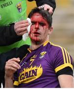 20 January 2018; (EDITORS NOTE; This image contains graphic content) Eanna Martin of Wexford receives treatment for a cut over his right eye during the Bord na Mona Walsh Cup Final match between Kilkenny and Wexford at Nowlan Park in Kilkenny. Photo by Matt Browne/Sportsfile