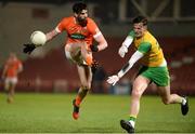 20 January 2018; Aaron Findon of Armagh has his shot blockd down by Jason McGee of Donegal during the Bank of Ireland Dr. McKenna Cup semi-final match between Donegal and Armagh at Celtic Park in Derry. Photo by Oliver McVeigh/Sportsfile