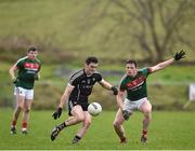 21 January 2018; Finnian Cawley of Sligo in action against Stephen Coen of Mayo during the Connacht FBD League Round 5 match between Sligo and Mayo at James Stephen's Park in Ballina, Co Mayo. Photo by Seb Daly/Sportsfile