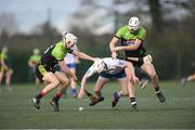 21 January 2018; Colm Stapleton of Mary Immaculate College Limerick in action against Cathal Dunbar, left and  Martin Kavanagh of IT Carlow during the Electric Ireland HE GAA Fitzgibbon Cup Group D Round 1 match between IT Carlow and Mary Immaculate College Limerick at Heywood Community School in Laois. Photo by Eóin Noonan/Sportsfile