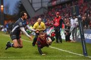 21 January 2018; Keith Earls of Munster goes over to score his side's first try despite the attention of Julien Dumora of Castres during the European Rugby Champions Cup Pool 4 Round 6 match between Munster and Castres at Thomond Park in Limerick. Photo by Stephen McCarthy/Sportsfile