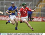 31 July 2003; Cork's Fergus Murphy in action against Tipperary's Martin Maher. Erin Munster Under 21 Hurling Final, Tipperary v Cork, Semple Stadium, Co. Tipperary. Picture credit; Damien Eagers / SPORTSFILE *EDI*