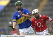 31 July 2003; Tipperary's Tony Scroope in action against Cork's Shane Murphy. Erin Munster Under 21 Hurling Final, Tipperary v Cork, Semple Stadium, Co. Tipperary. Picture credit; Damien Eagers / SPORTSFILE *EDI*