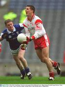 4 May 2003; Colin Holmes, Tyrone, in action against Brian McDonald, Laois. Allianz National Football League Division 1 Final, Tyrone v Laois, Croke Park, Dublin. Football. Picture credit; Brendan Moran / SPORTSFILE