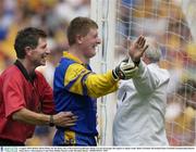 4 August 2003; Referee Brian White sees the funny side as Roscommon goalkeeper Shane Curran encourages the umpire to signal a wide. Bank of Ireland All-Ireland Senior Football Championship Quarter Final, Kerry v Roscommon, Croke Park, Dublin. Picture credit; Brendan Moran / SPORTSFILE *EDI*