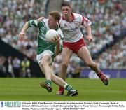 3 August 2003; Tom Brewster, Fermanagh, in action against Tyrone's Sean Cavanagh. Bank of Ireland All-Ireland Senior Football Championship Quarter Final, Tyrone v Fermanagh, Croke Park, Dublin. Picture credit; Damien Eagers / SPORTSFILE *EDI*