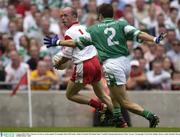 3 August 2003; Peter Canavan, Tyrone, in action against Fermanagh's Ryan McCloskey. Bank of Ireland All-Ireland Senior Football Championship Quarter Final, Tyrone v Fermanagh, Croke Park, Dublin. Picture credit; Brendan Moran / SPORTSFILE *EDI*