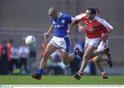 3 August 2003; Barry Brennan of Laois in action against Aidan O'Rourke of Armagh  during the Bank of Ireland All-Ireland Senior Football Championship Quarter Final between Laois and Armagh at Croke Park in Dublin. Photo by Brendan Moran/Sportsfile