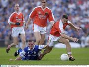 3 August 2003; Diarmaid Marsden of Armagh in action against Darren Rooney of Laois during the Bank of Ireland All-Ireland Senior Football Championship Quarter Final between Laois and Armagh at Croke Park in Dublin. Photo by Damien Eagers/Sportsfile