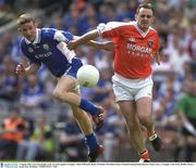 3 August 2003; Gary Kavanagh of Laois in action against Aidan O'Rourke of Armagh during the Bank of Ireland All-Ireland Senior Football Championship Quarter Final between Laois and Armagh at Croke Park in Dublin. Photo by Ray McManus/Sportsfile