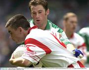 3 August 2003; Ryan McMenamin, Tyrone, in action against Fermanagh's Raymond Gallagher. Bank of Ireland All-Ireland Senior Football Championship Quarter Final, Tyrone v Fermanagh, Croke Park, Dublin. Picture credit; Ray McManus / SPORTSFILE *EDI*